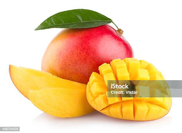 Multiple Mangos One Cut And One Sliced In A Pattern Stock Photo - Download Image Now
