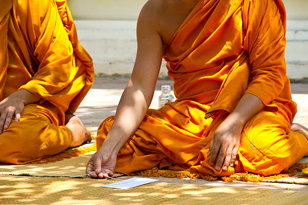istock monks and religious rituals in thai temple 450733019
