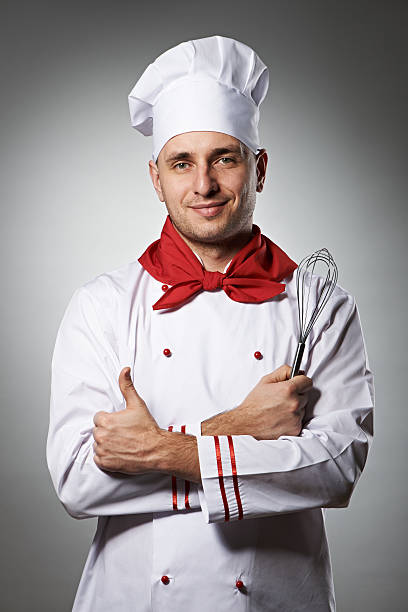 istock Male chef with thumb up portrait 450737169