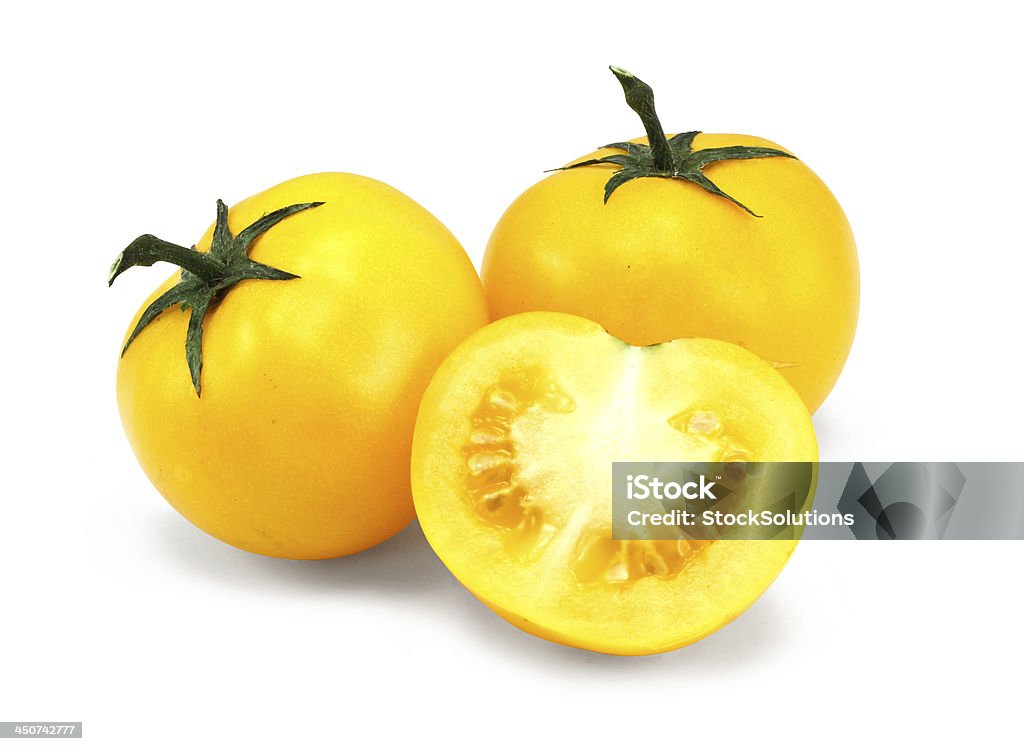 home grown yellow tomatoes homegrown Yellow tomato harvest from a greenhouse, vegetable produce grown by gardeners. Color Image Stock Photo