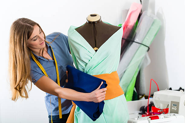 istock Fashion designer or tailor working in studio 450751731