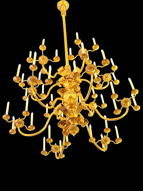 istock Golden antique chandelier isolated in black 450754319