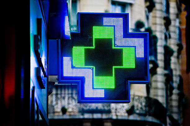 istock Illuminated Drugstore sign in Paris 450756021