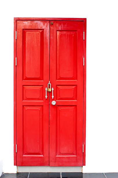 istock Red door in white background 450769523