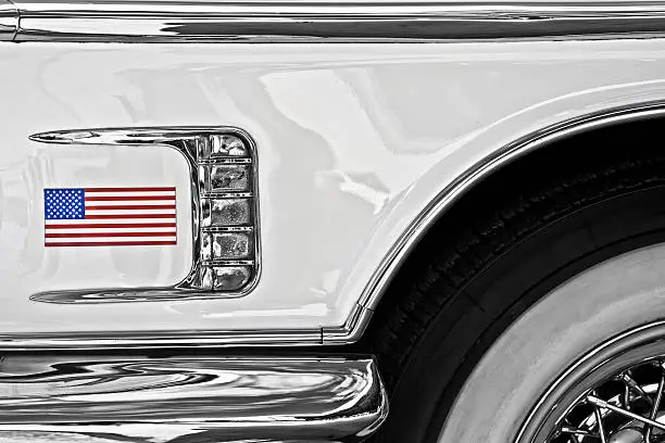 Star Spangled Banner on the fender of a classic American car