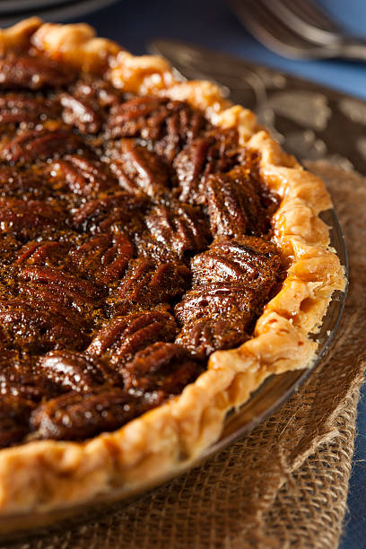istock Homemade pecan pie with golden crust 450779235
