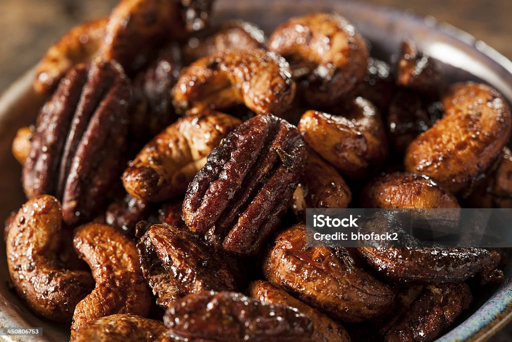 Brown Candied Caramelized Nuts Brown Candied Caramelized Nuts with Cinnamon and Spices Almond Stock Photo