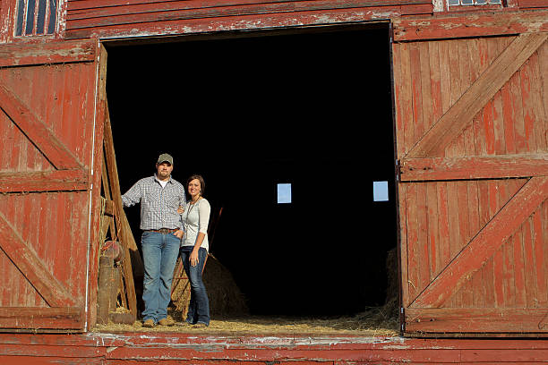 istock Man and Woman in Barn 450813225