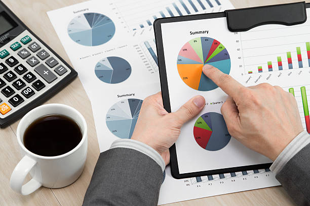 istock business report and man hand 450813471