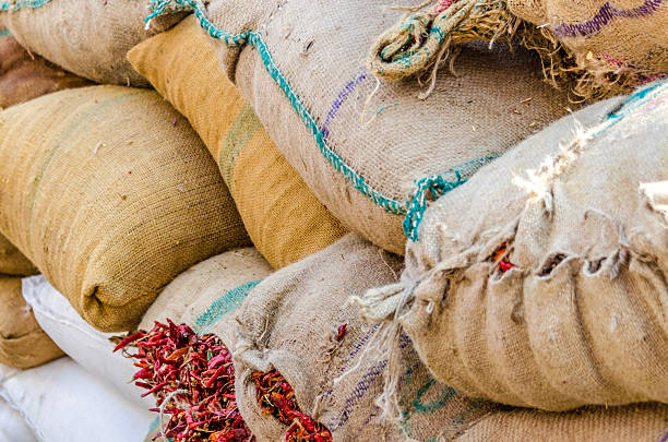 Torn stacked sacks of Spices