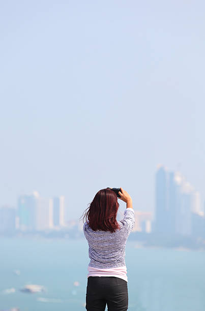 istock Happy celebrating winning success woman at sunset 450816773