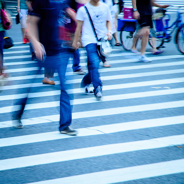 istock people walking on big city street 450820665