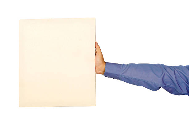 istock Male Hand Holding A Square Canvas 450823459