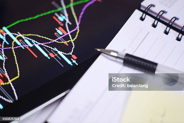 Digital Tablet With Stock Charts Stock Photo - Download Image Now - Analyzing, Ballpoint Pen, Bank Account