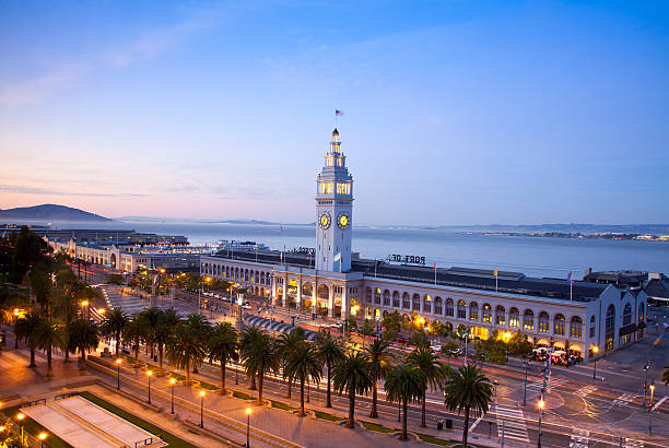 San Francisco Ferry Building The San Francisco Ferry Building at dusk on Embarcadero and Market Street. fishermans wharf san francisco photos stock pictures, royalty-free photos & images
