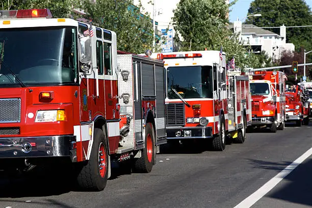 Parade of modern firetrucks