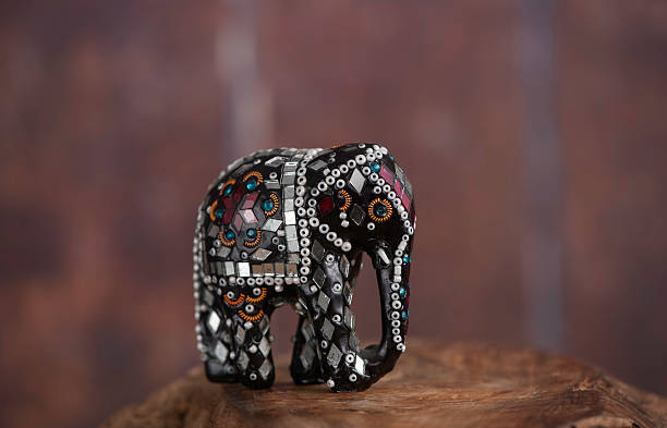 Bejeweled Elephant Figurine Bejeweled elephant figurine. A charm of good luck in the India and the Hindu religion elephant figurine stock pictures, royalty-free photos & images