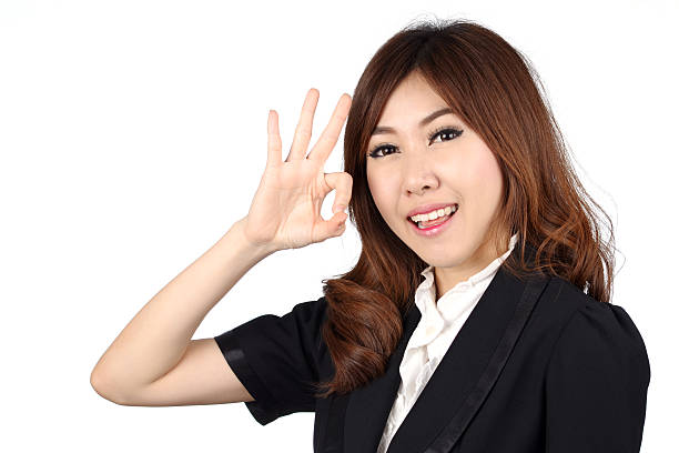 istock young asian businesswoman on white background 450833439