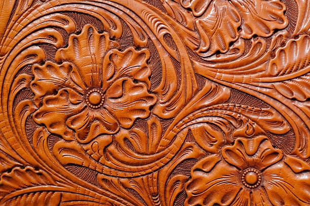 hand bearbeitetem leder - carved ornament stock-fotos und bilder