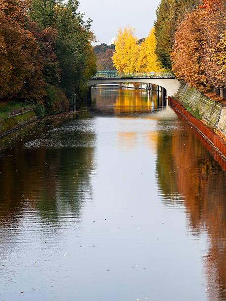 istock bridge and leaves fall on Landwehrkanal 450839645