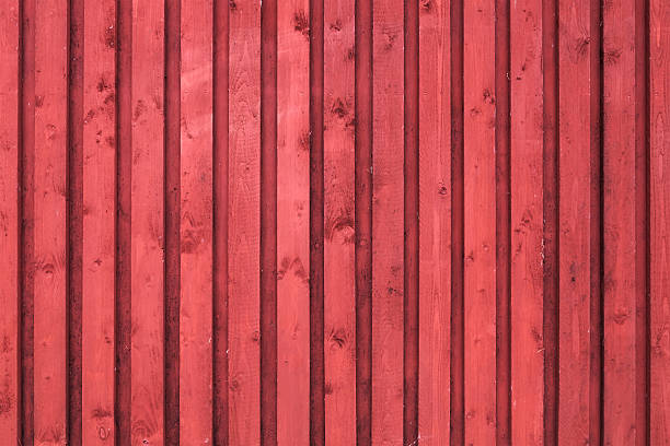 istock Red rural wooden wall. Photo background texture 450843129