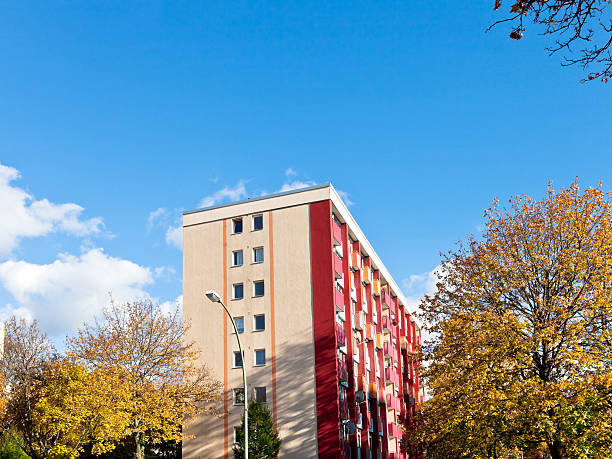 istock residential apartment building in autumn 450845691