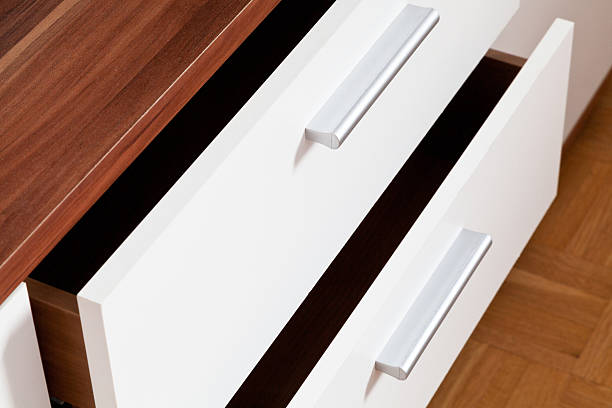 istock open drawers of linen cupboard 450845709