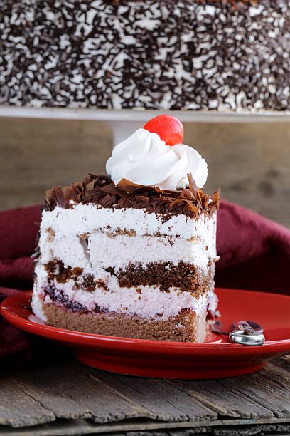 istock Chocolate cake with cherries and whipped cream (Black Forest) 450846355