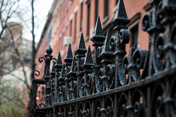 istock Black wrought iron fence 450847139