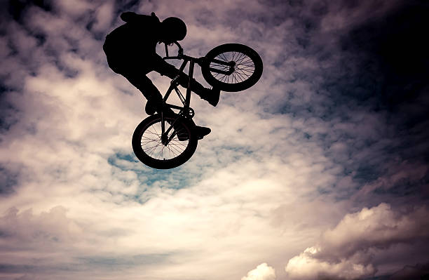 istock Man doing an jump with a bmx bike. 450848053