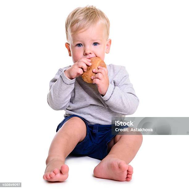 Baby Eats Bread Stock Photo - Download Image Now - 12-17 Months, Activity, Babies Only