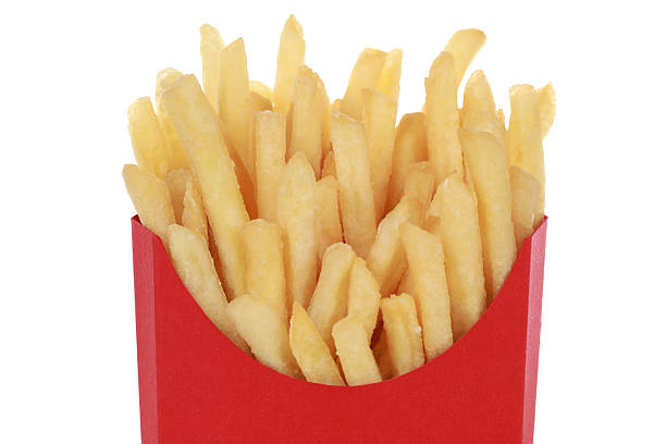 istock French fries in a box, isolated 450854603