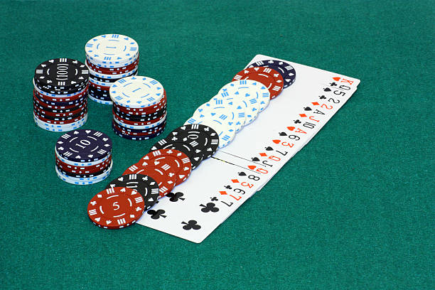 istock Stacks of chips and some playing cards 450855413