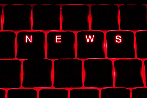 istock 'News' Illuminated Keyboard Text in Red 450858761
