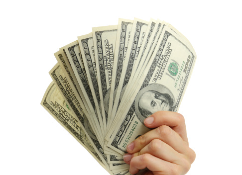 woman hand with dollars isolated on a white background