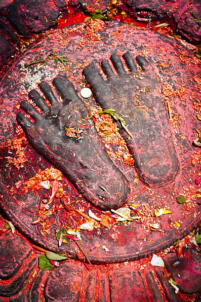 Buddhism symbol Lord Buddha feet inprited in stone in Kathmandu,near Swayambhunath stupa,Nepal