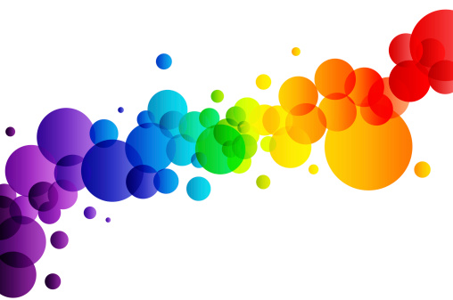Many colorful bubbles exploding on white background