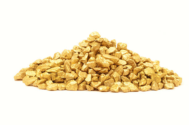 Heap of gold nuggets on white background