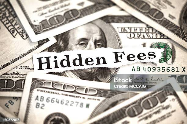 Hidden Fees Stock Photo - Download Image Now - Fee, Hiding, American One Hundred Dollar Bill