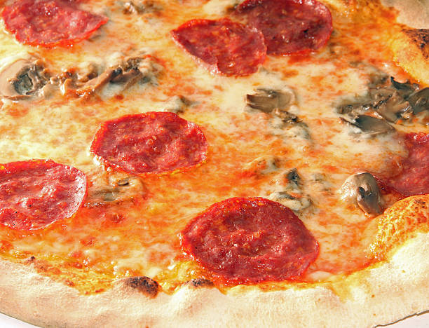 istock pizza with pepperoni and mushrooms 450872787