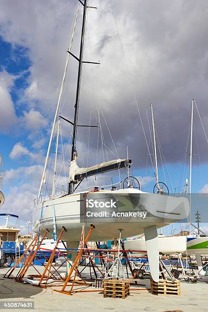 Boat Repairs Stock Photo - Download Image Now - Anchor - Vessel Part, Anchored, Arranging