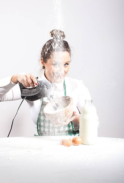istock Crazy cooking housewife 450875073