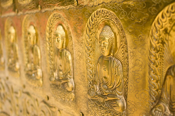 istock Golden statue of buddha 450875567