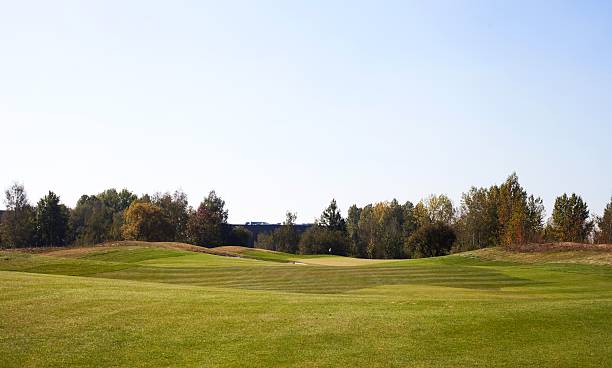 istock Autumn Golf course landscape view green field 450875577