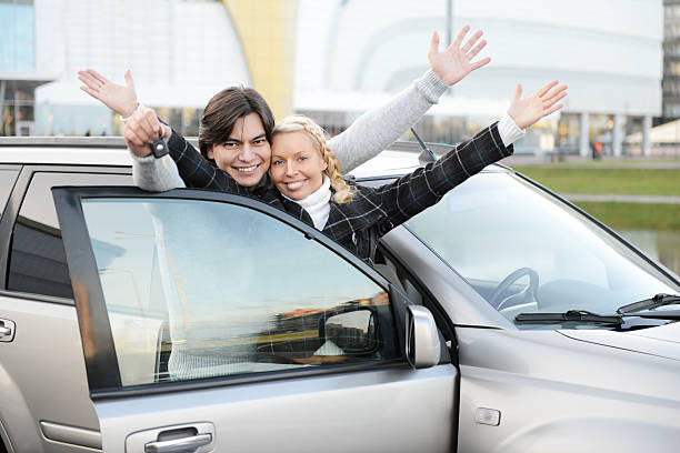 young couple buys a car