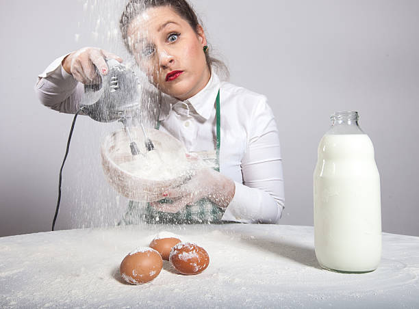 istock Crazy cooking housewife 450876647