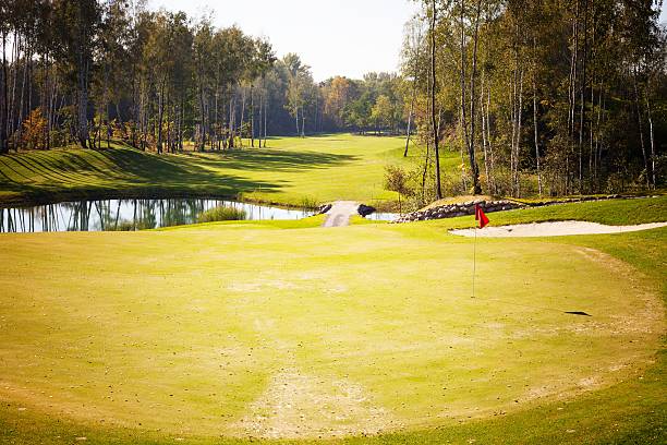 istock Autumn Golf course landscape view green field 450910225
