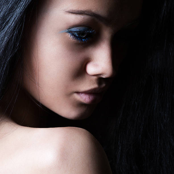 istock Glamor woman dark face portrait 450910729