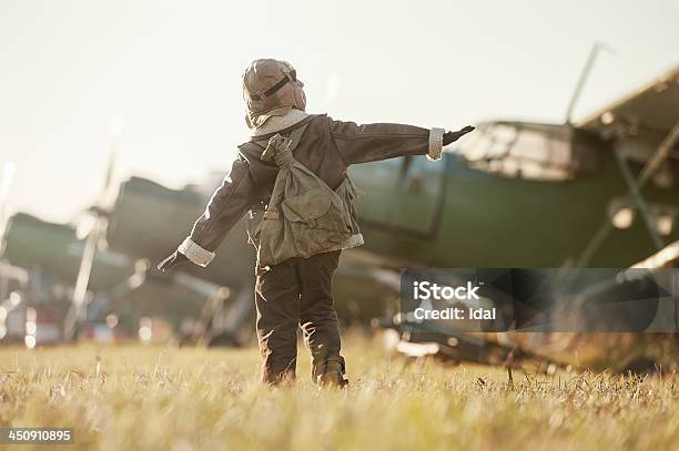Portrait Of A Young Aviator Parked Aircraft Stock Photo - Download Image Now - Day Dreaming, Dreamlike, Large