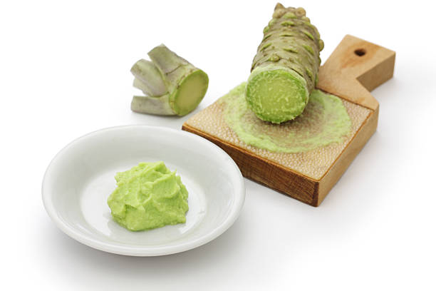 istock Freshly grated wasabii using a shark skin grater 450912313